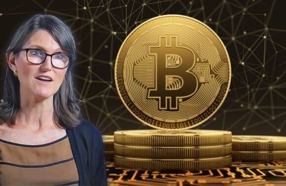 Cathie Wood Cuts Down Coinbase's Stake as Bitcoin Holds $56k High